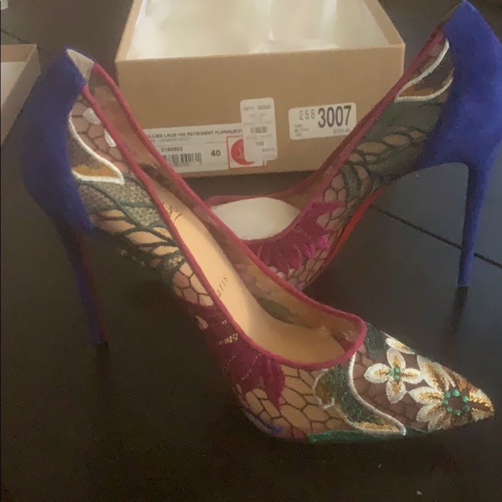 Louboutin heels, never worn, in original, size 40